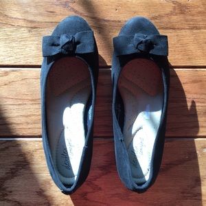 black flats with a bow on front